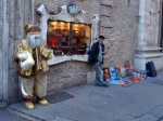 Santa and painter in Via del Corso, Rome