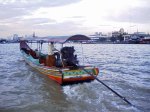 Thai boat powered by outboard engine
